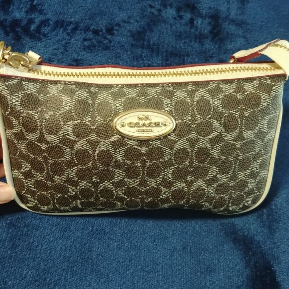 Coach Brown and Cream Clutch with Gold Accents